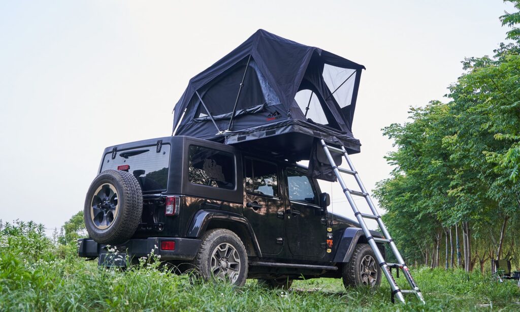 A picture of the roof tent in the forest